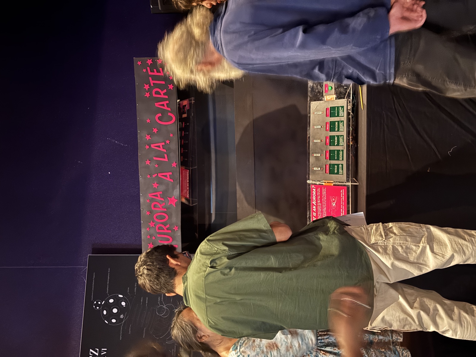 Visitors interacting with the finished exhibit at Fiske Planetarium